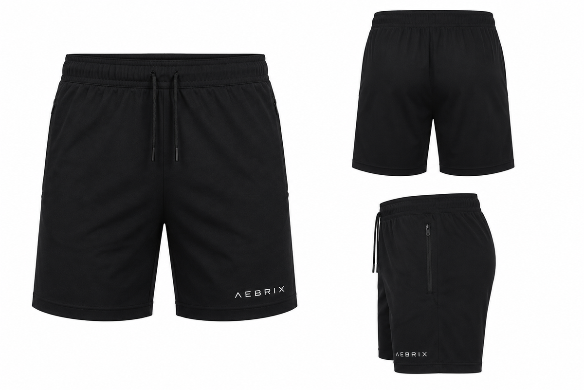 Three views of black athletic shorts by AEBRIX on a white background: a front view with drawstring waist, a back view, and a side view with zippered pocket.